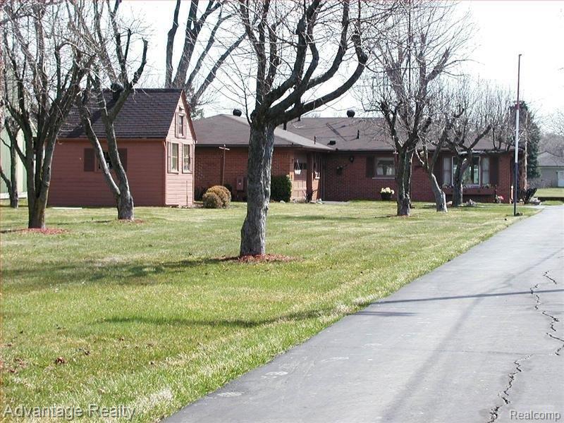 32327 Sutton Road New Baltimore, MI 48047 - Photo 1 of 17 Front