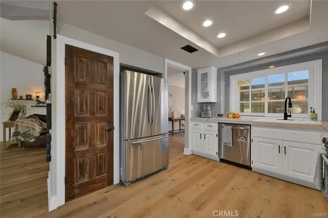 a view of livingroom with furniture wooden floor and window