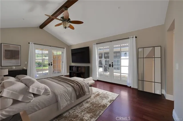 a bathroom with a sink vanity and mirror