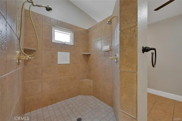 a bathroom with a toilet a sink and a mirror