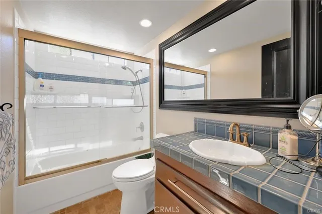 a view of a room with furniture staircase and a porch