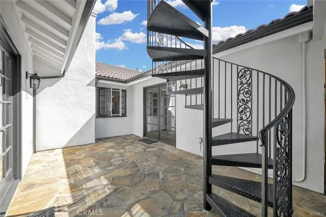 a view of a terrace with a garden