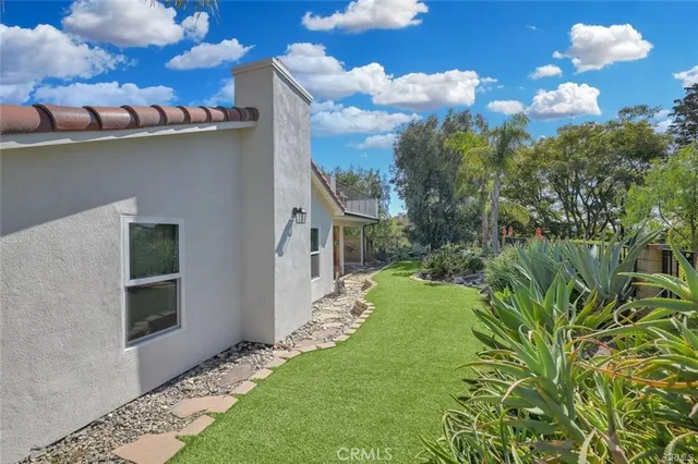 a view of a golf course with plants