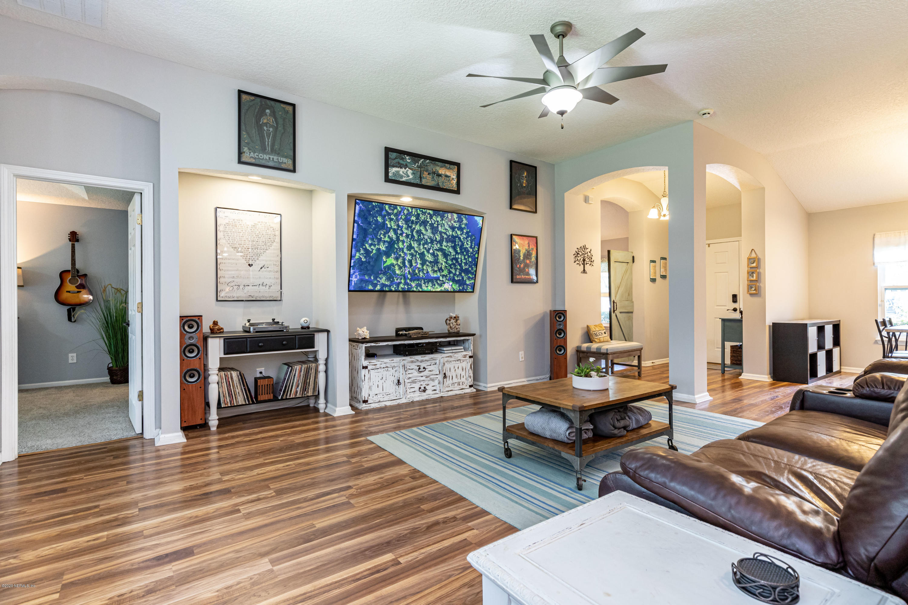 951 Silver Spring Court St. Augustine, FL 32092 - Photo 15 of 40 a living room with furniture and a flat screen tv