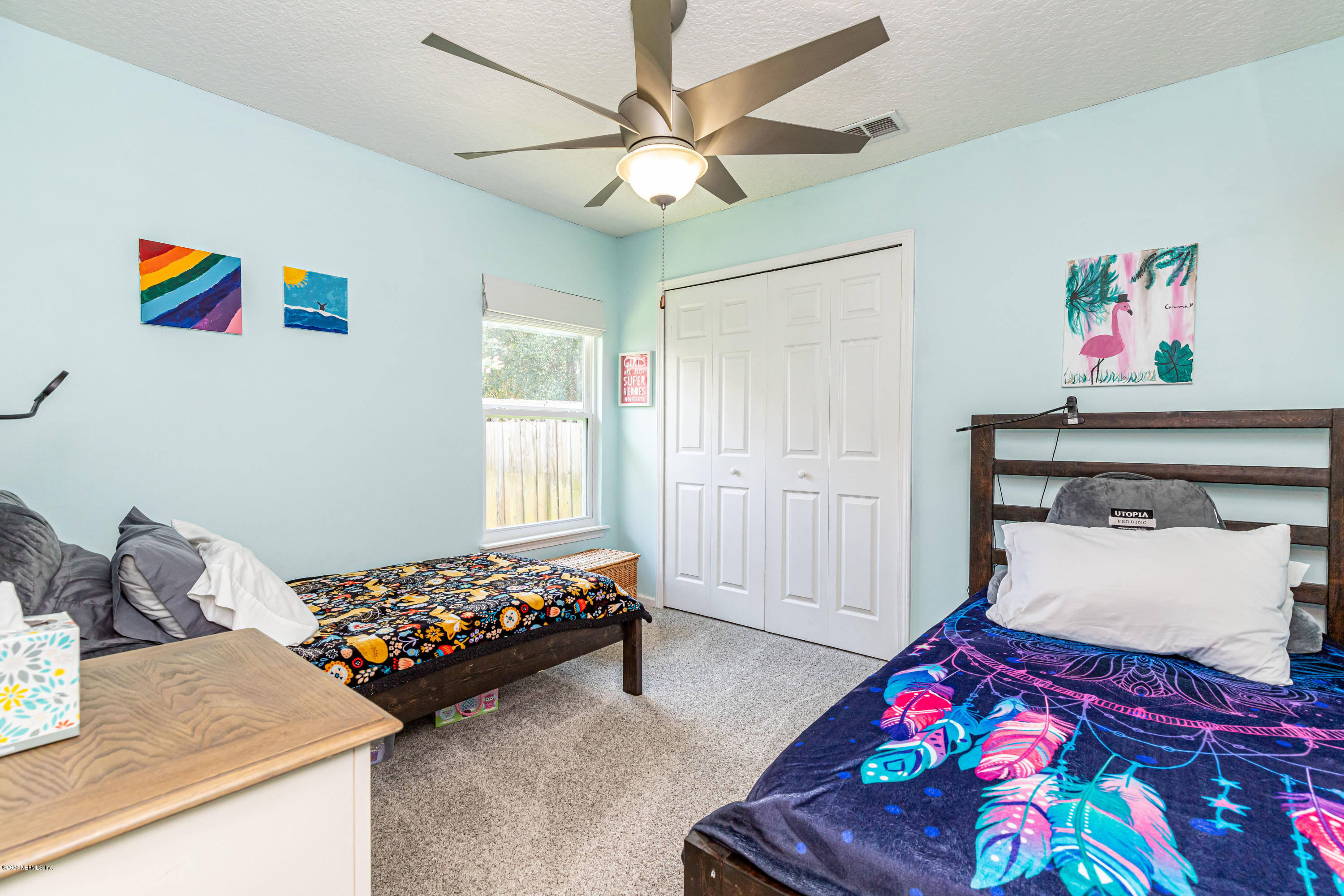 951 Silver Spring Court St. Augustine, FL 32092 - Photo 30 of 40 a bedroom with bed and furniture