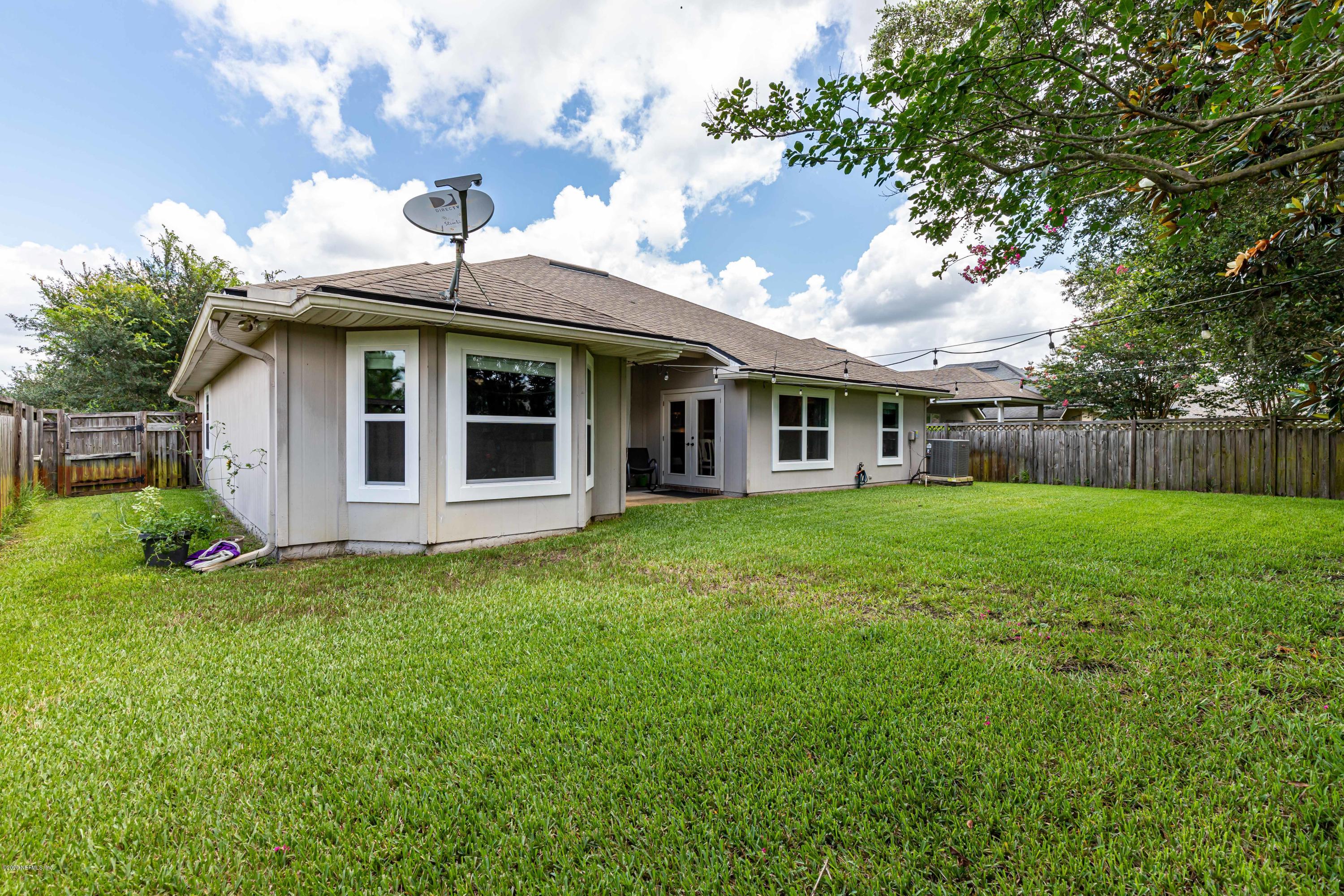 951 Silver Spring Court St. Augustine, FL 32092 - Photo 38 of 40 a view of a house with a yard