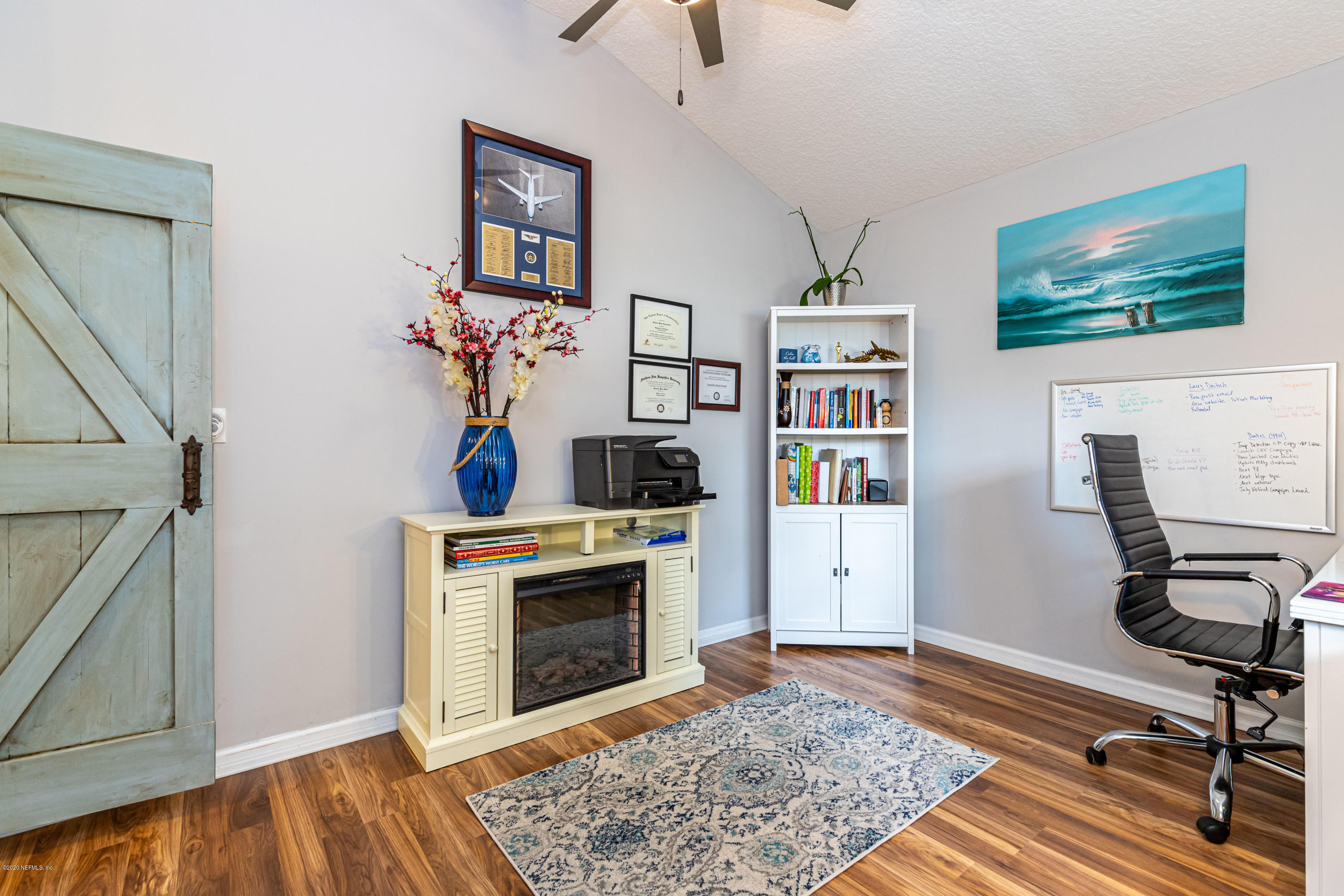 951 Silver Spring Court St. Augustine, FL 32092 - Photo 9 of 40 a living room with furniture and a fireplace