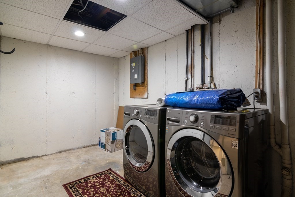 38 Farmland Road, Unit A Lowell, MA 01850 - Photo 26 of 26 a utility room with dryer and washer