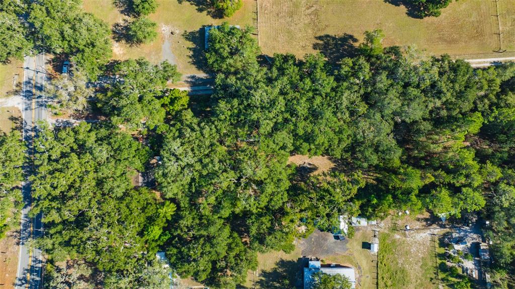 9580 McIntosh Road Dover, FL 33527 - Photo 15 of 15 an aerial view of a house with a yard