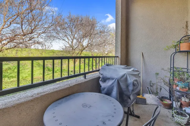 a view of staircase with white walls