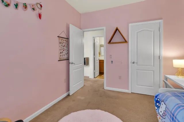 an aerial view of a house with swimming pool