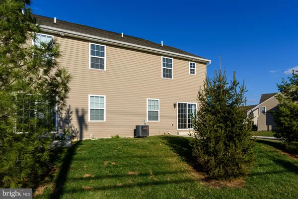 a front view of house with yard