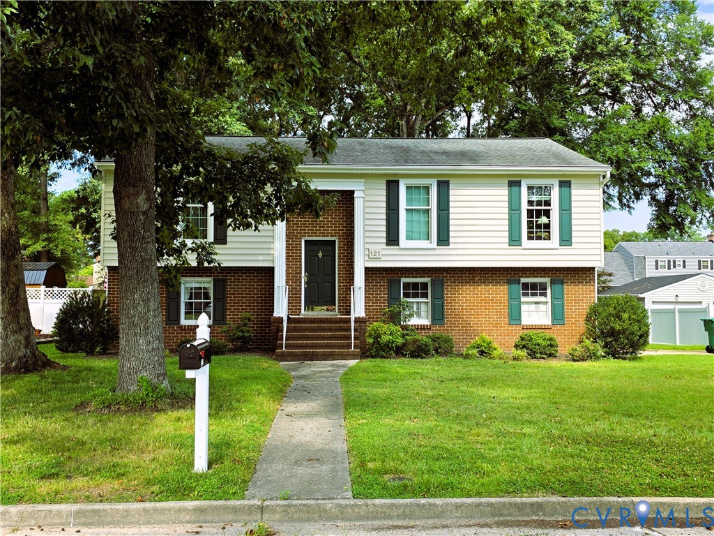 121 Huntington Road Colonial Heights, VA 23834 - Photo 1 of 1 Split-level residence featuring a brick and siding