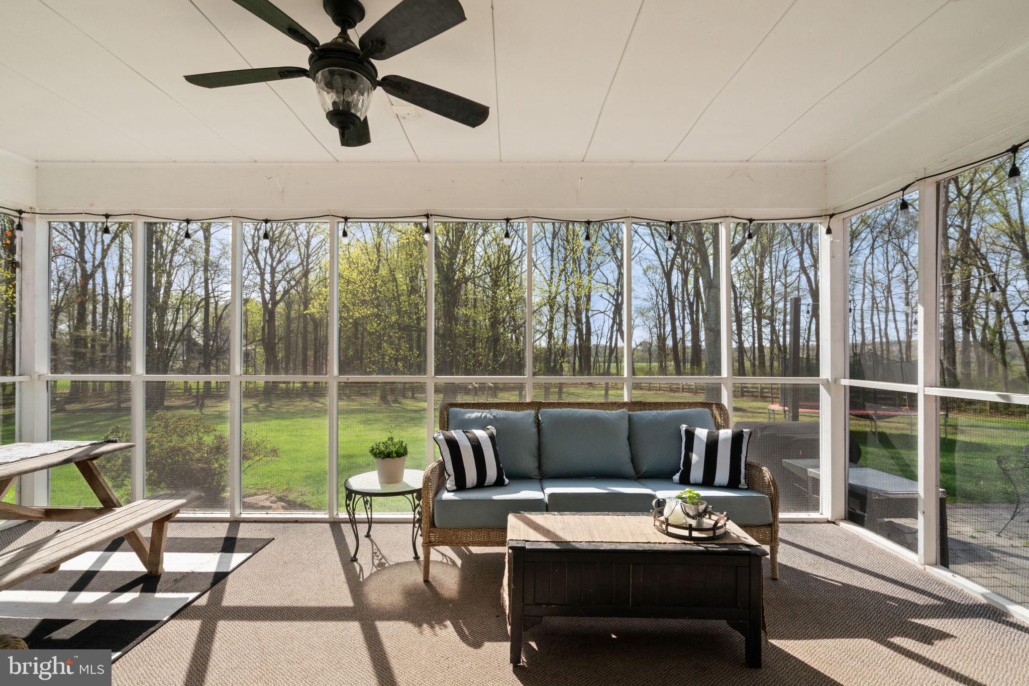 19728 Gleedsville Road Leesburg, VA 20175 - Photo 49 of 61 Serene screened porch with nature views.