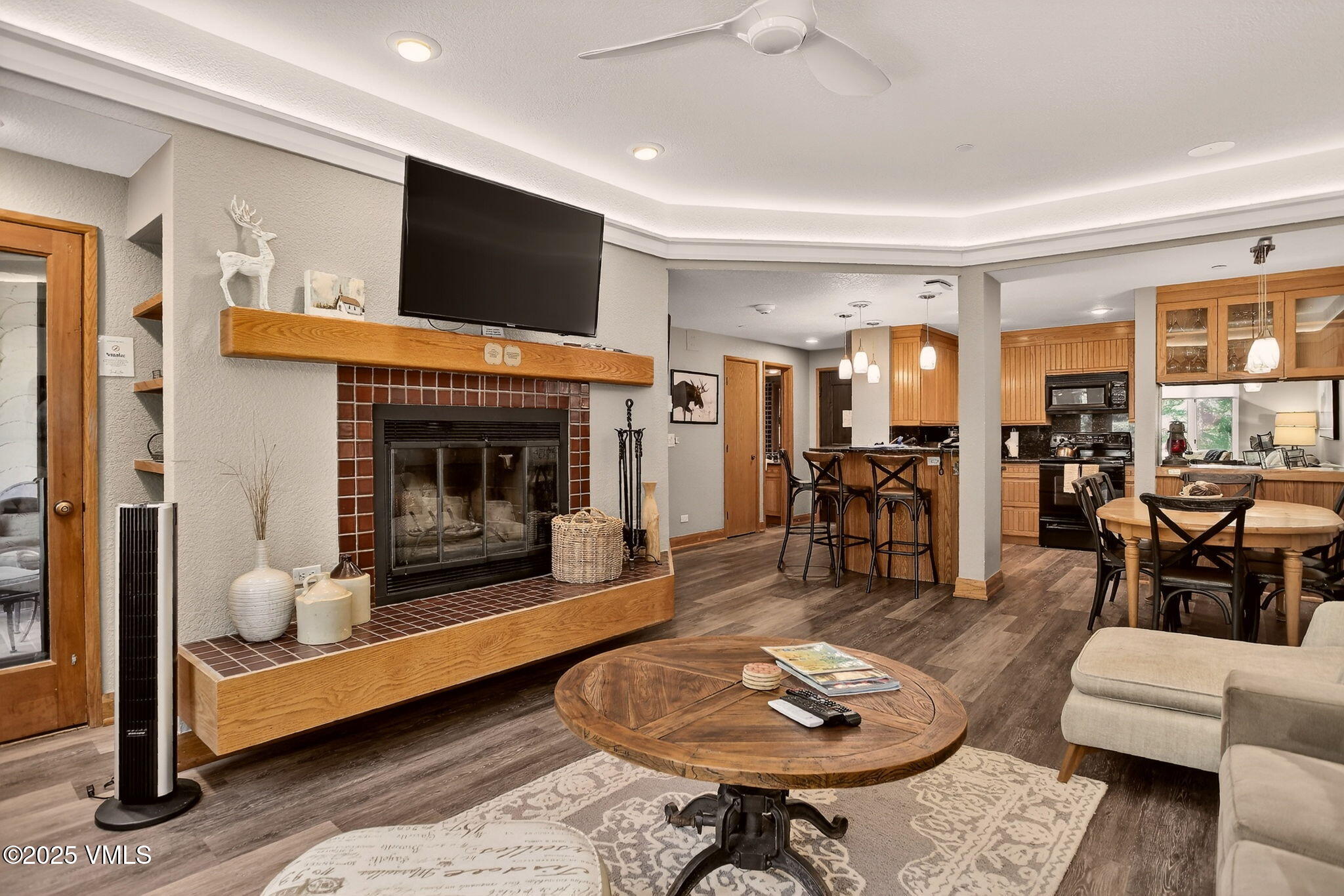 120 Offerson Road, Unit 5160 Beaver Creek, CO 81620 - Photo 22 of 30 a living room with furniture and a fireplace