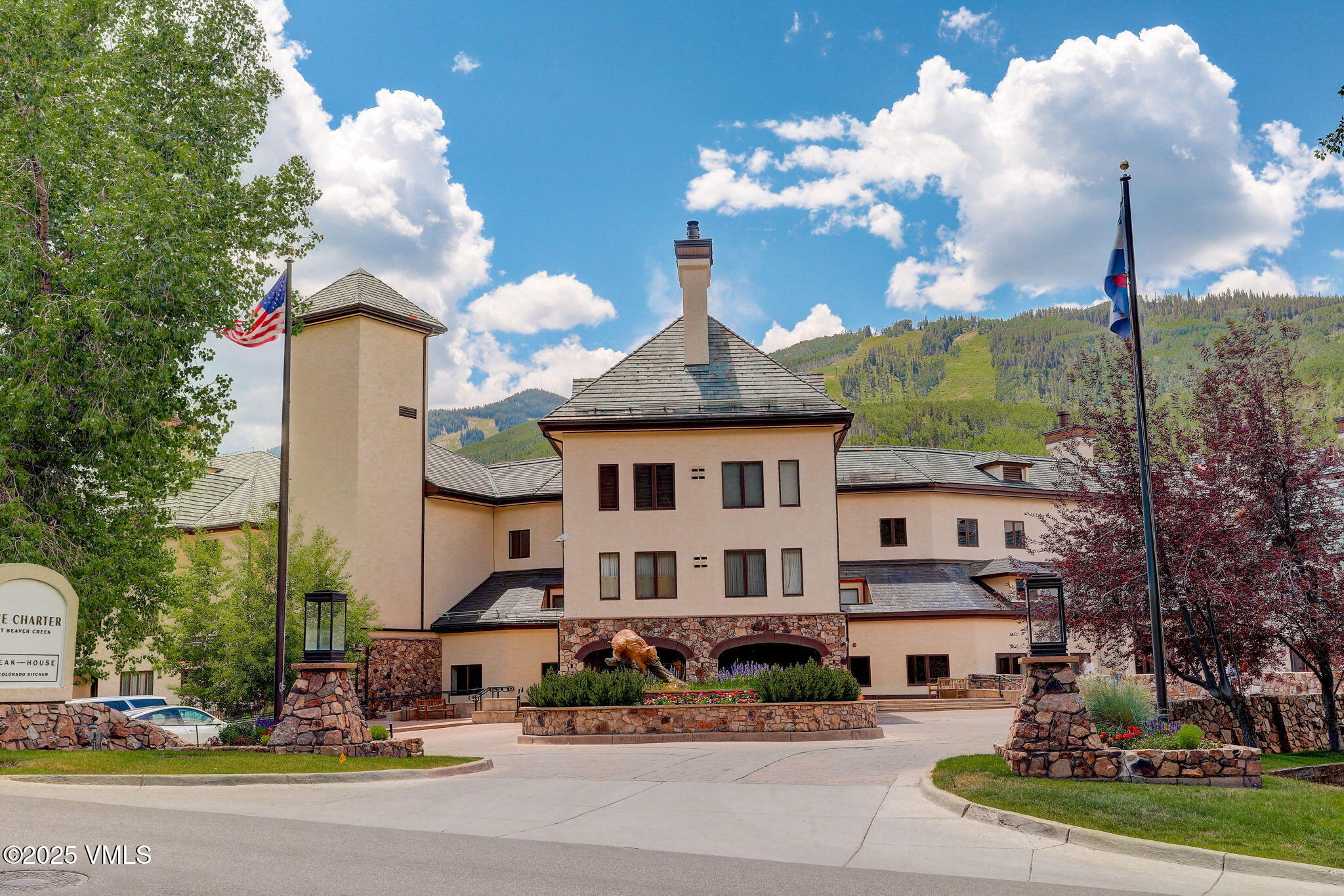 120 Offerson Road, Unit 5160 Beaver Creek, CO 81620 - Photo 27 of 30 a view of a white building among the street and a building