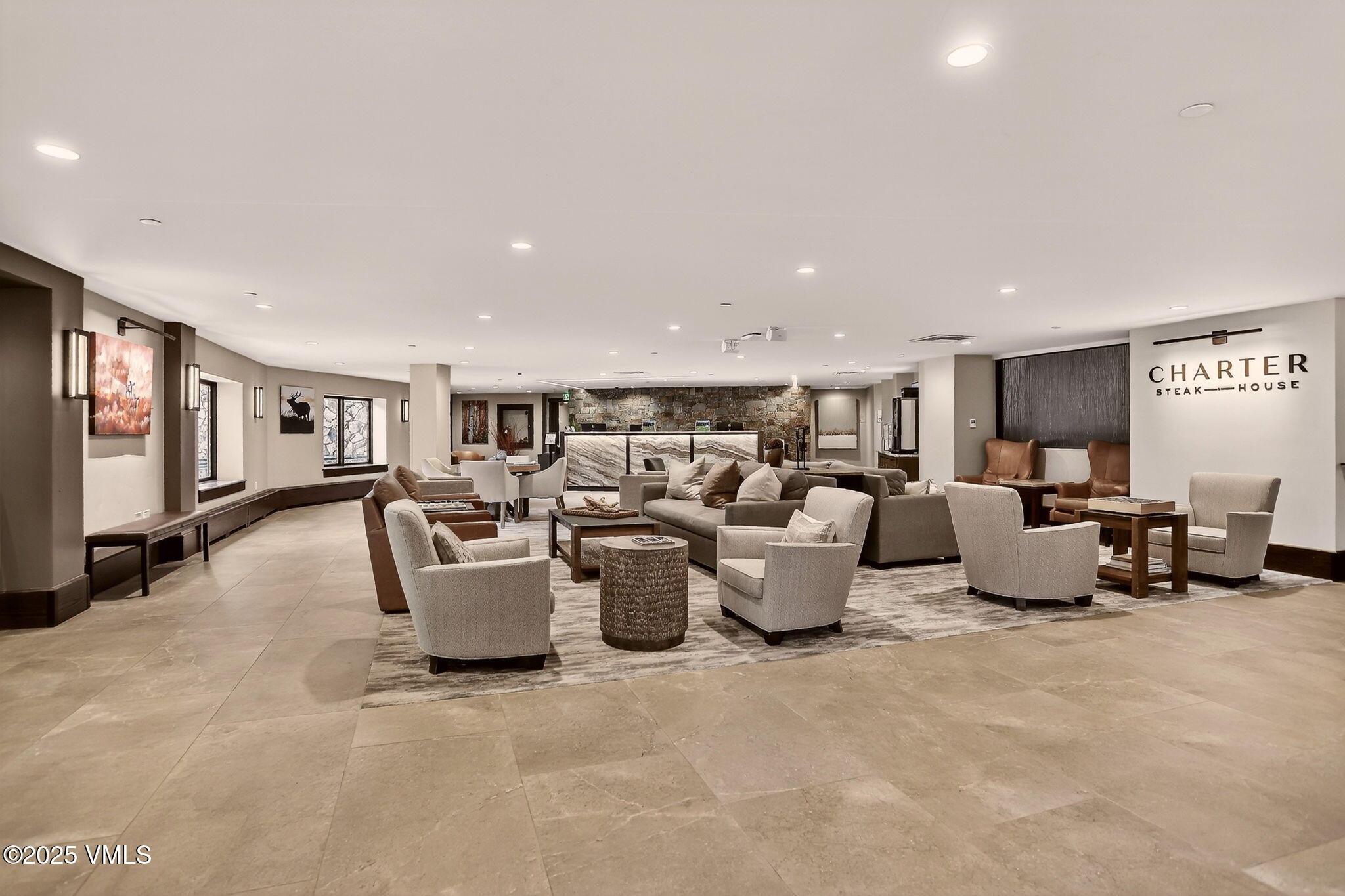 120 Offerson Road, Unit 5160 Beaver Creek, CO 81620 - Photo 30 of 30 a living room with lots of white furniture and a couch