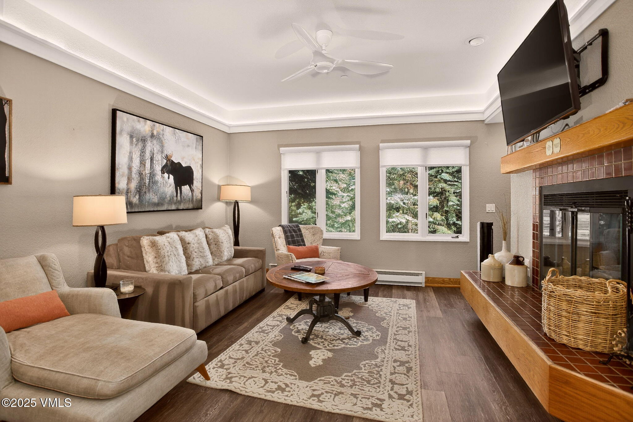 120 Offerson Road, Unit 5160 Beaver Creek, CO 81620 - Photo 3 of 30 a living room with furniture and a flat screen tv