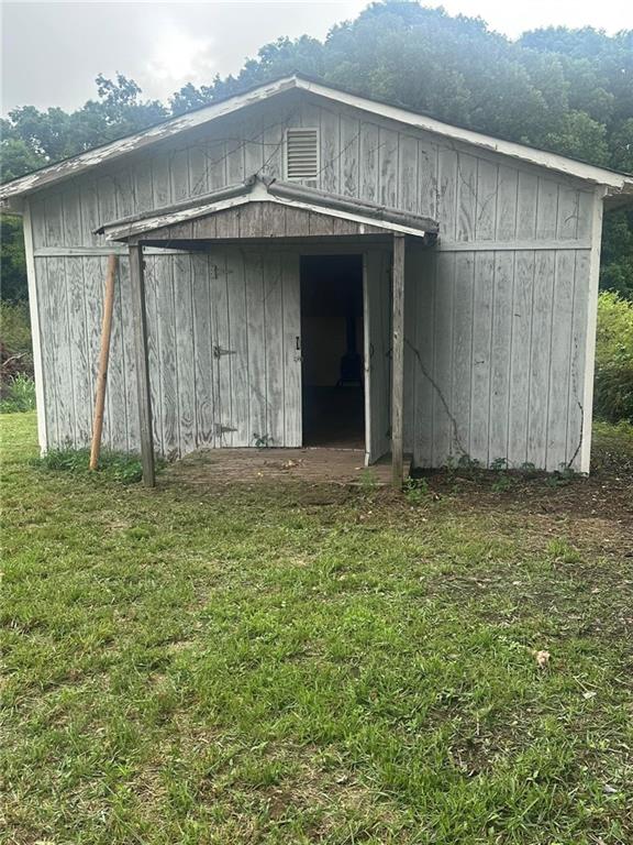 749 Chambers Road Commerce, GA 30530 - Photo 11 of 13 a house with a yard