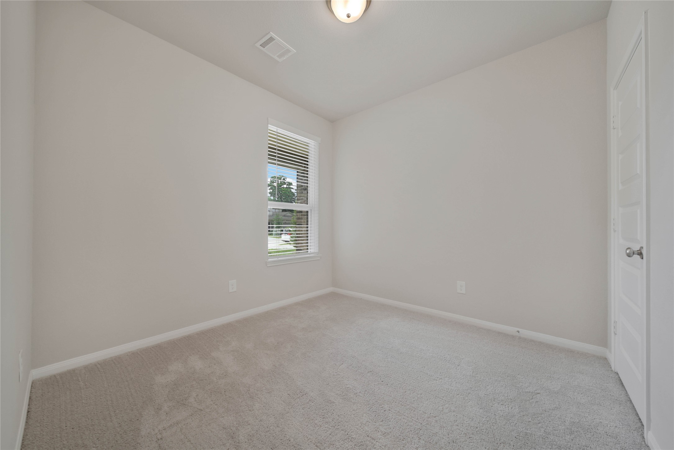 7080 Silverleaf Oak Street Conroe, TX 77304 - Photo 16 of 35 The secondary bedrooms are a nice size and they are bright with generous closet space.