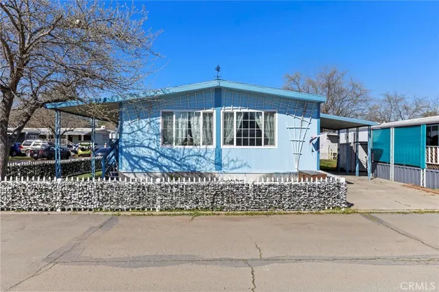 a front view of a house with a garage