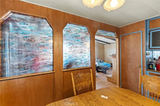 a kitchen with stainless steel appliances a stove and more cabinets