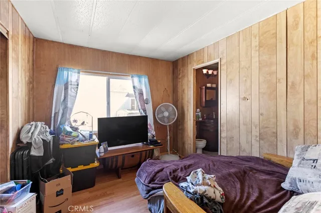 a view of a dining room with furniture wooden floor and chandelier