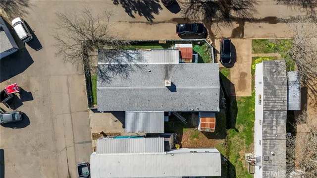 an aerial view of a house with a garden
