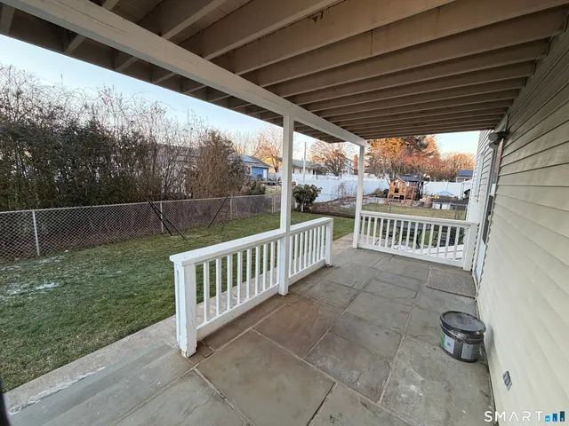a view of backyard with deck