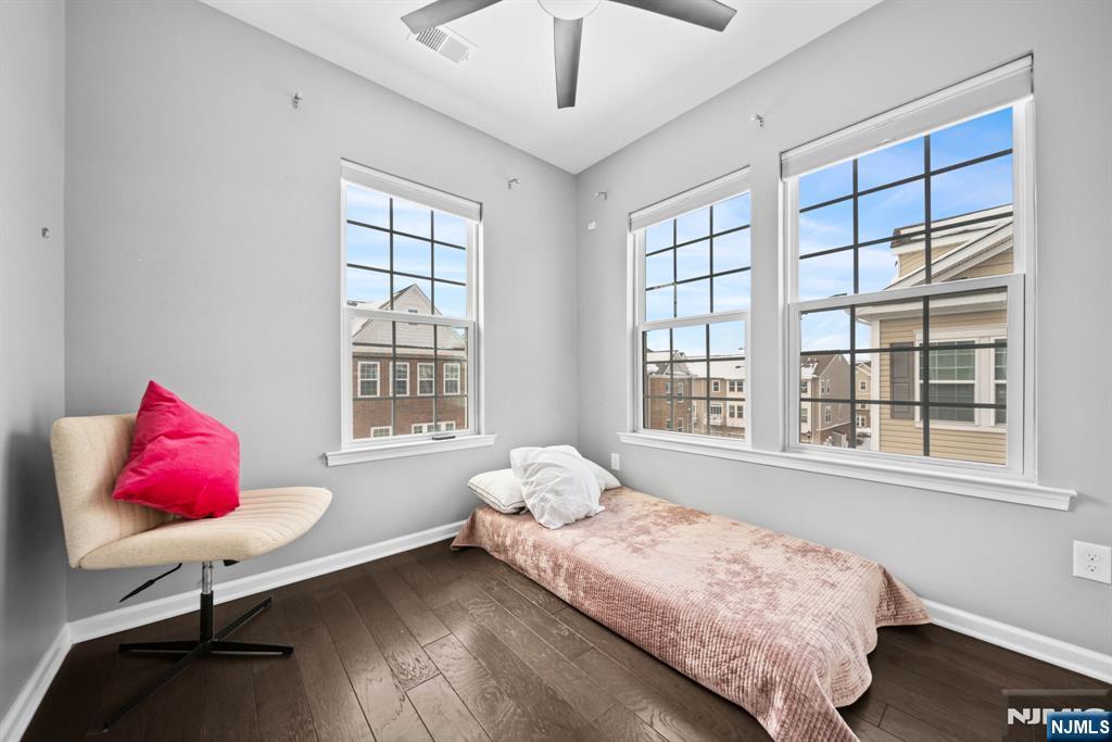 84 Truman Drive, Unit 2801 Wood-Ridge, NJ 07075 - Photo 30 of 46 a bedroom with a bed and window