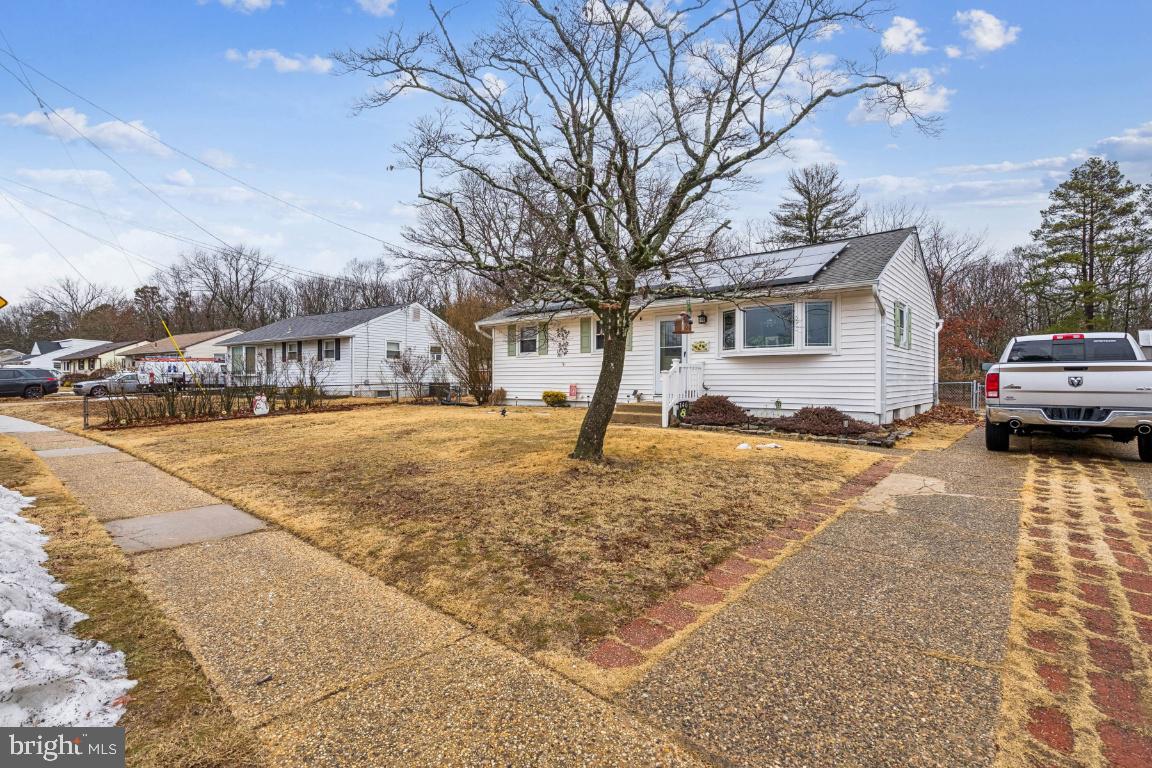 146 Country Club Road Pine Hill, NJ 08021 - Photo 3 of 28 a view of a yard with a house