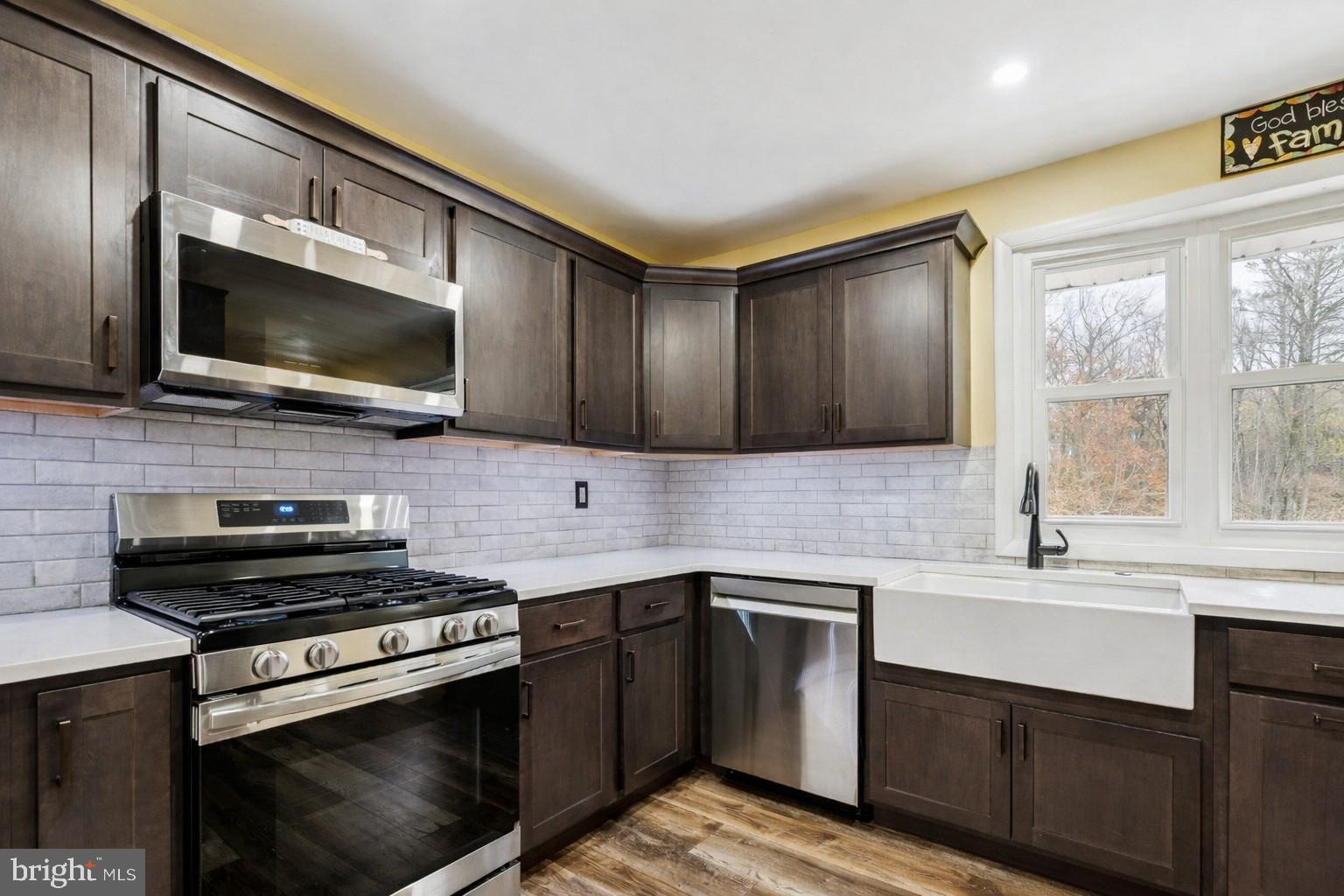 146 Country Club Road Pine Hill, NJ 08021 - Photo 10 of 28 a kitchen with a sink stove top oven and cabinets