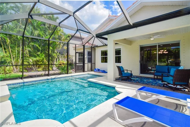 a house view with a sitting space and garden