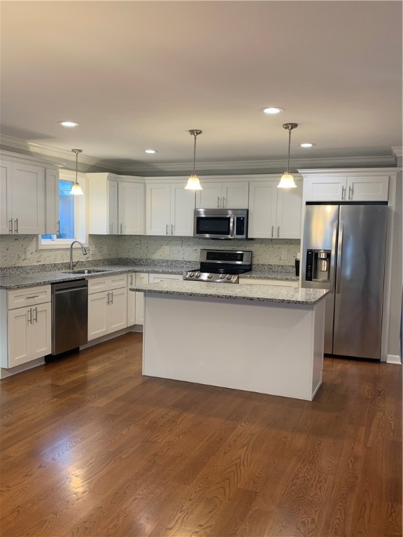 1520 Chopmist Hill Road Scituate, RI 02857 - Photo 4 of 11 Kitchen Island, Granite counters and Backsplash are upgrades.