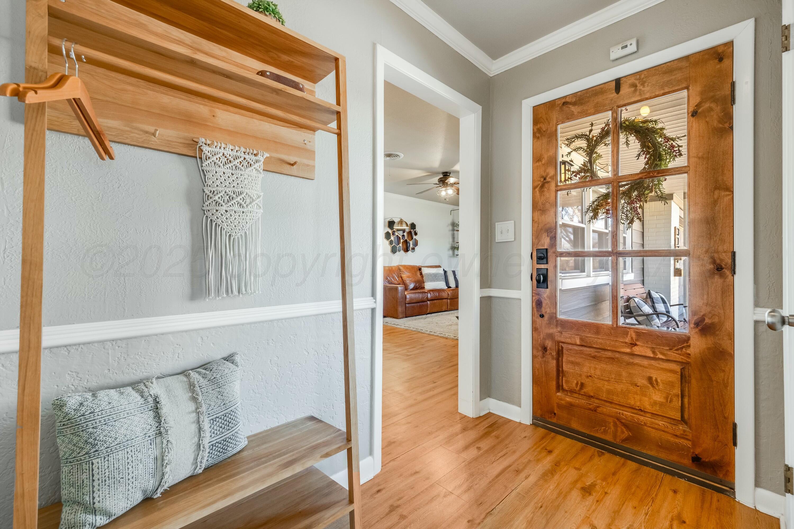 3128 Nebraska Street Amarillo, TX 79106 - Photo 6 of 34 a view of walk in closet with wooden floor