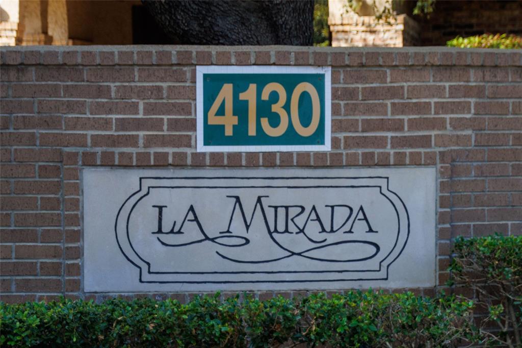4130 Proton Drive, Unit 47B Addison, TX 75001 - Photo 1 of 1 a wall with a sign on it