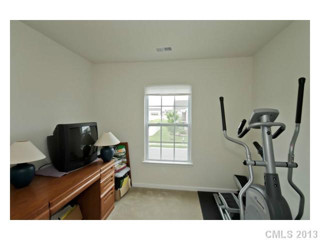 3342 Streamside Drive Davidson, NC 28036 - Photo 13 of 16 a living room with furniture and a window