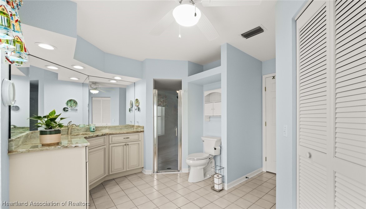 4500 Del Rio Court Sebring, FL 33875 - Photo 15 of 32 lovely ensuite with matching granite vanity and walk-in closet