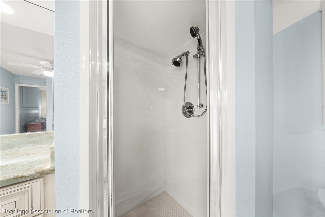 4500 Del Rio Court Sebring, FL 33875 - Photo 17 of 32 Modern walk-in shower in master ensuite