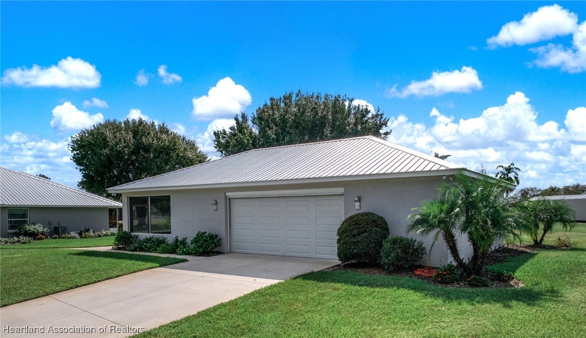 4500 Del Rio Court Sebring, FL 33875 - Photo 2 of 32 FANTASTIC 30' X 52' DETACHED WORKSHOP GARAGE