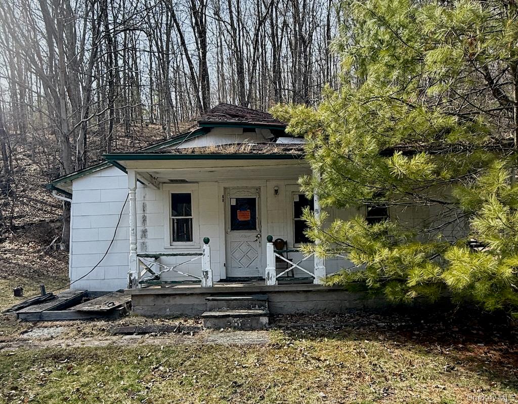 143 State Rte 55 Barryville, NY 12719 - Photo 2 of 8 a view of a house with a yard