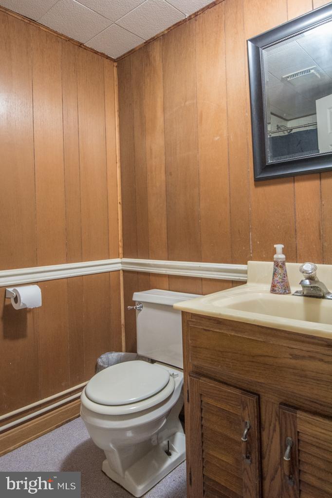 60 Dry Wells Road Christiana, PA 17509 - Photo 22 of 34 a bathroom with a sink a toilet and mirror