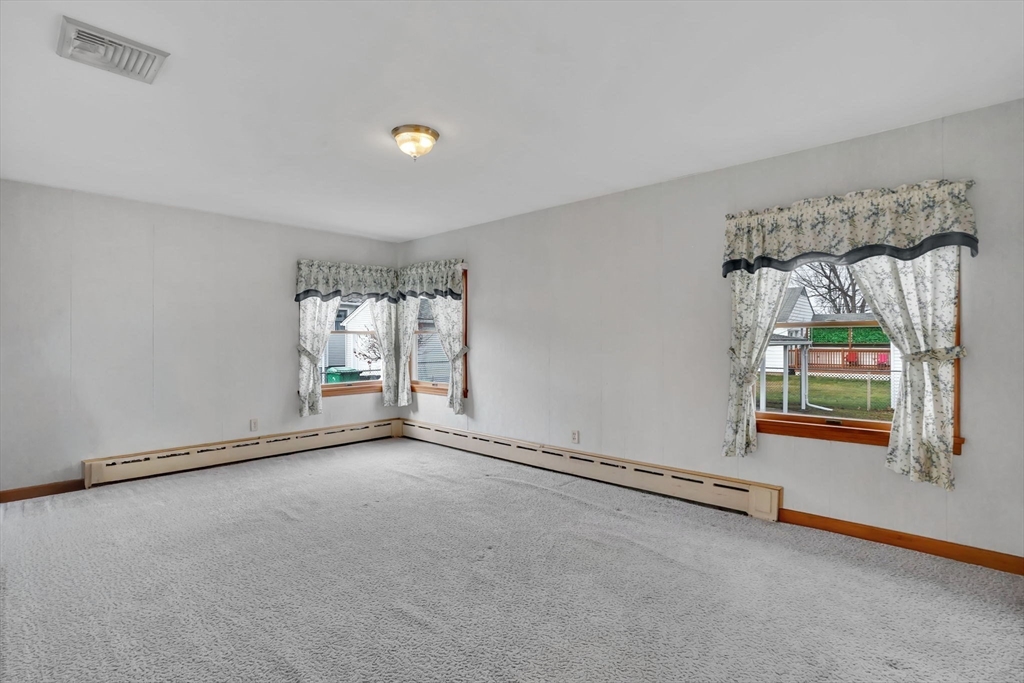 76 Roy Street Chicopee, MA 01013 - Photo 24 of 30 an empty room with windows