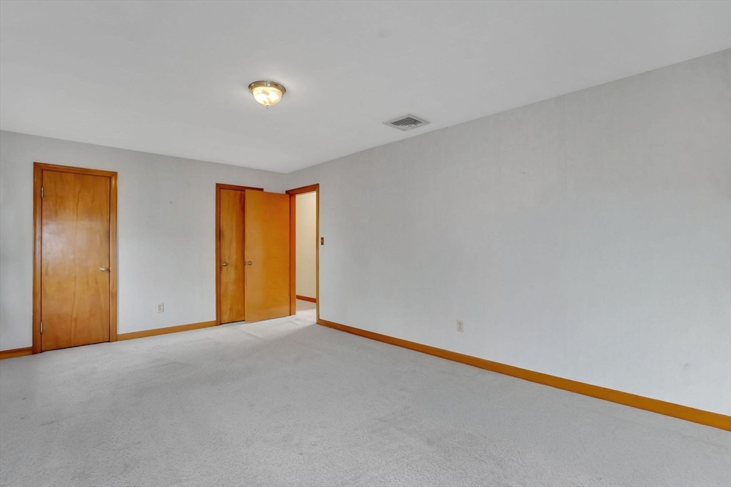 76 Roy Street Chicopee, MA 01013 - Photo 25 of 30 a view of an empty room with a window