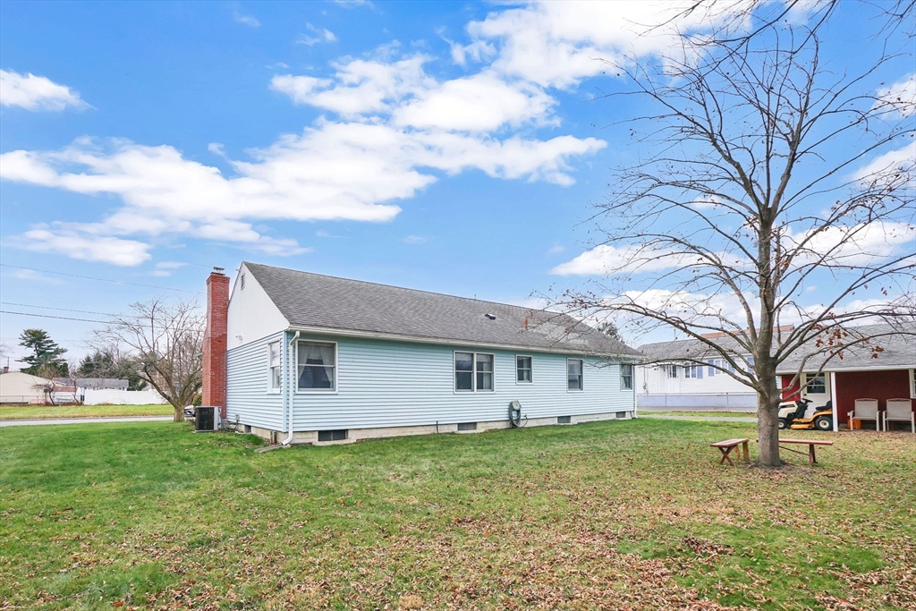 76 Roy Street Chicopee, MA 01013 - Photo 28 of 30 a view of a house with a back yard
