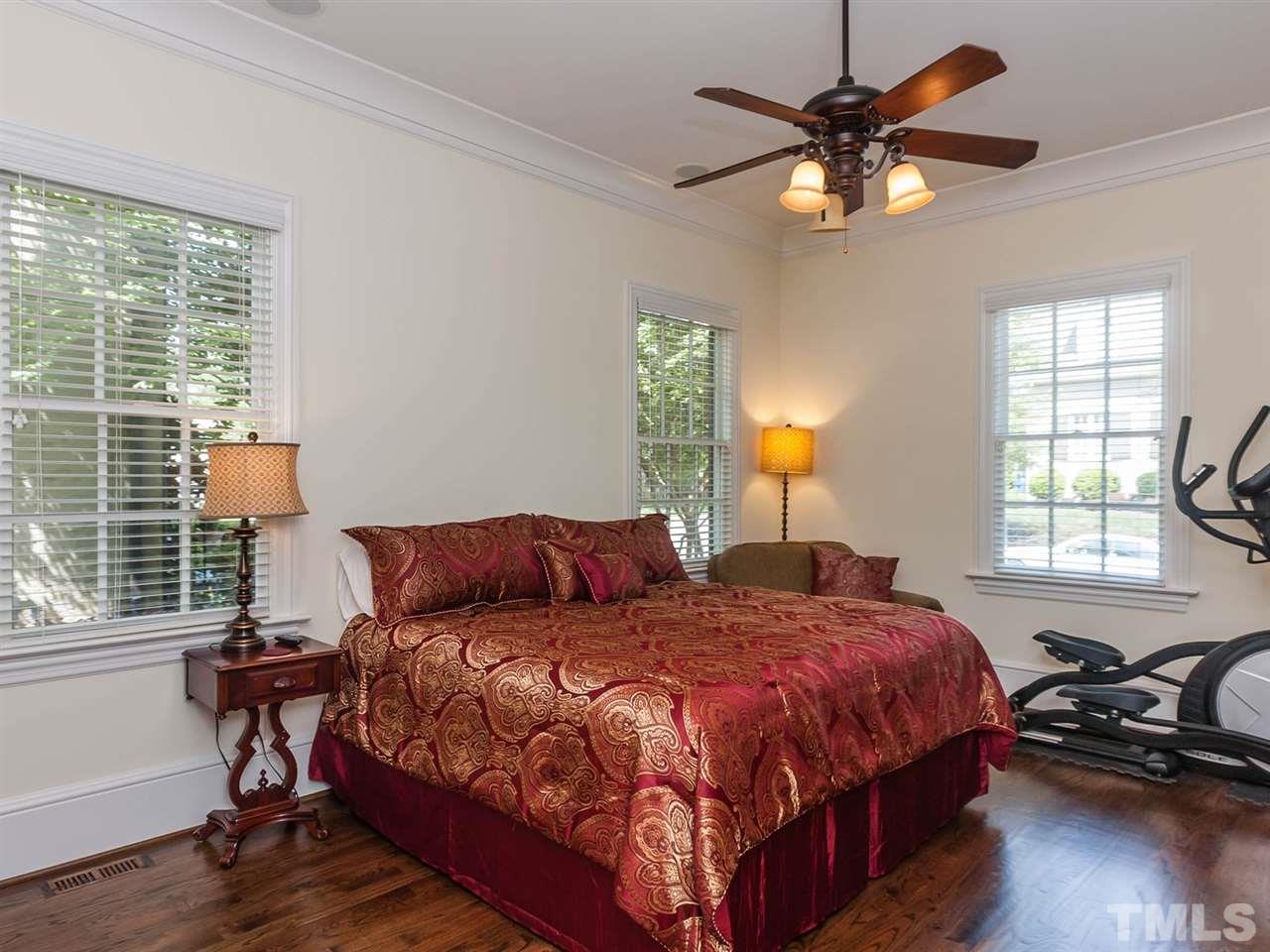 416 Wayne Drive Raleigh, NC 27608 - Photo 13 of 25 a bedroom with a bed and a window