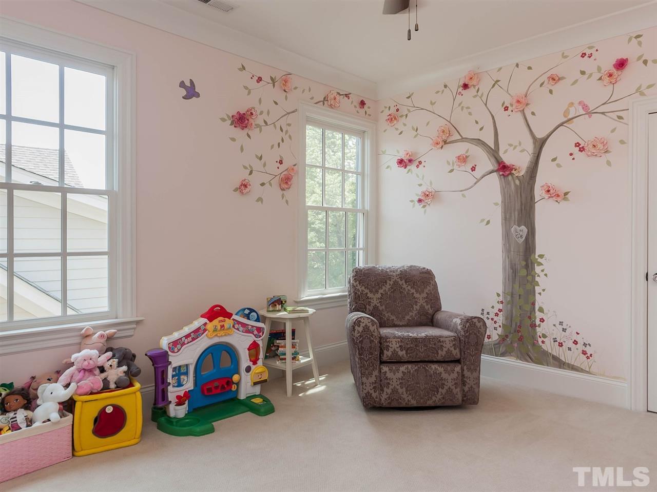 416 Wayne Drive Raleigh, NC 27608 - Photo 19 of 25 a bedroom with toys and a window