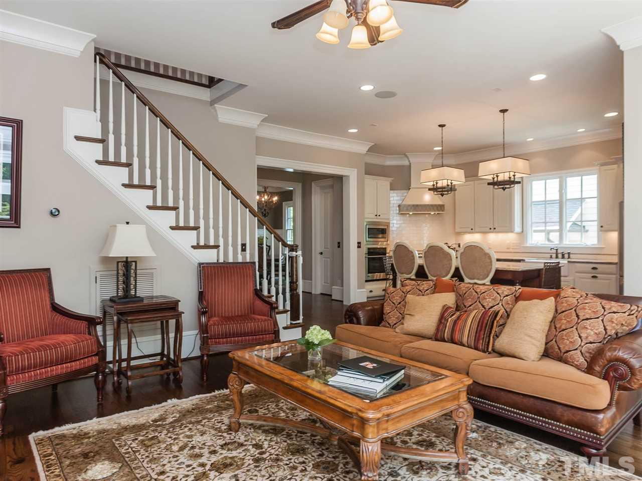 416 Wayne Drive Raleigh, NC 27608 - Photo 7 of 25 a living room with furniture potted plant and a table
