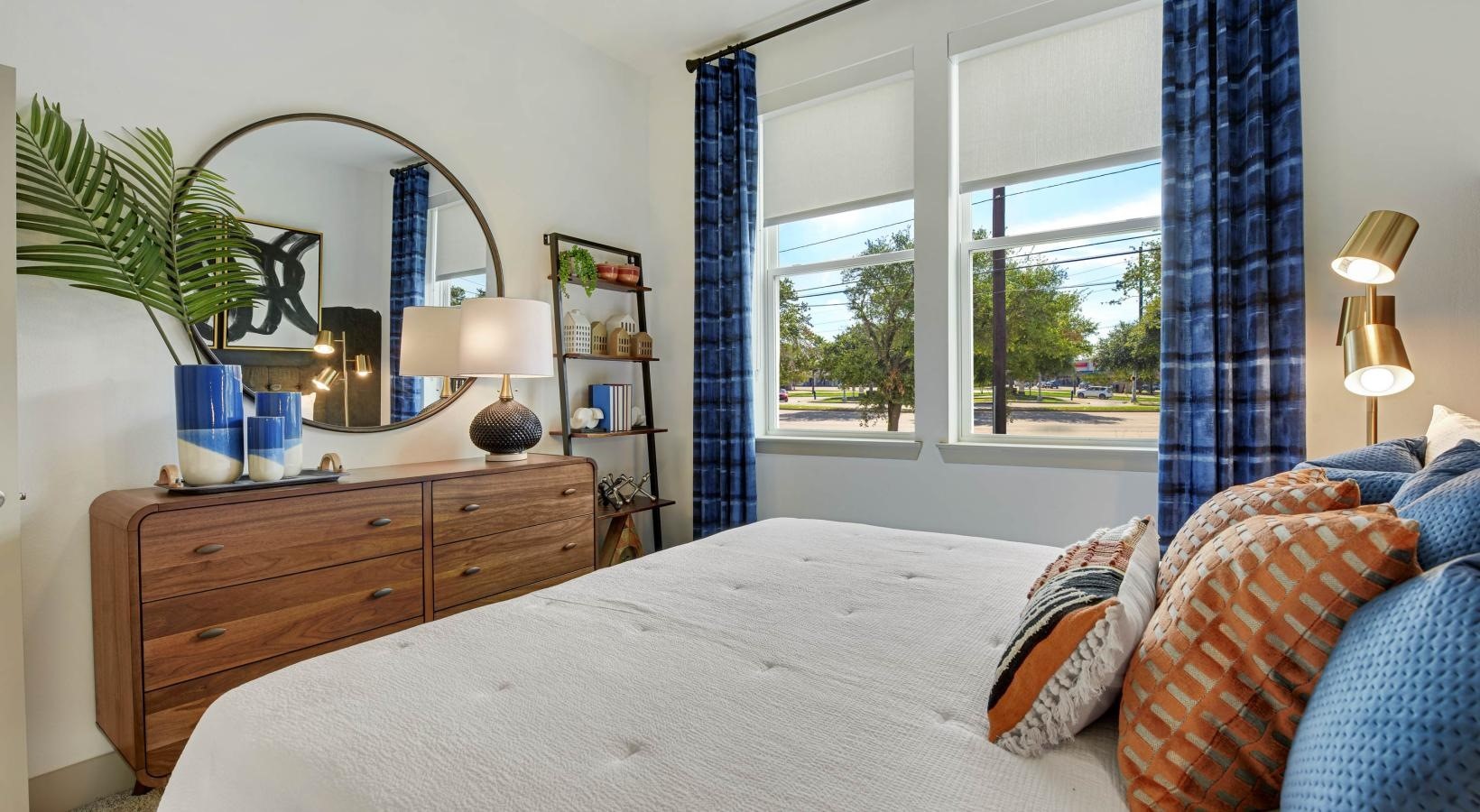 9330 South Main Street, Unit 258 Houston, TX 77025 - Photo 9 of 24 a bedroom with a bed and a large window