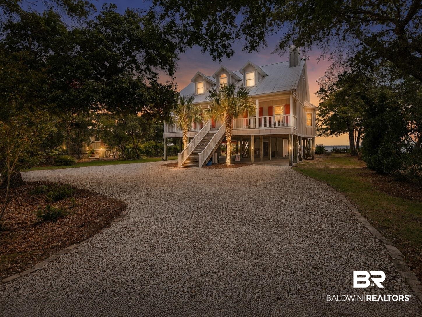6802 Shore Drive Elberta, AL 36530 - Photo 33 of 34 Elevated coastal residence featuring a metal roof and red shutters